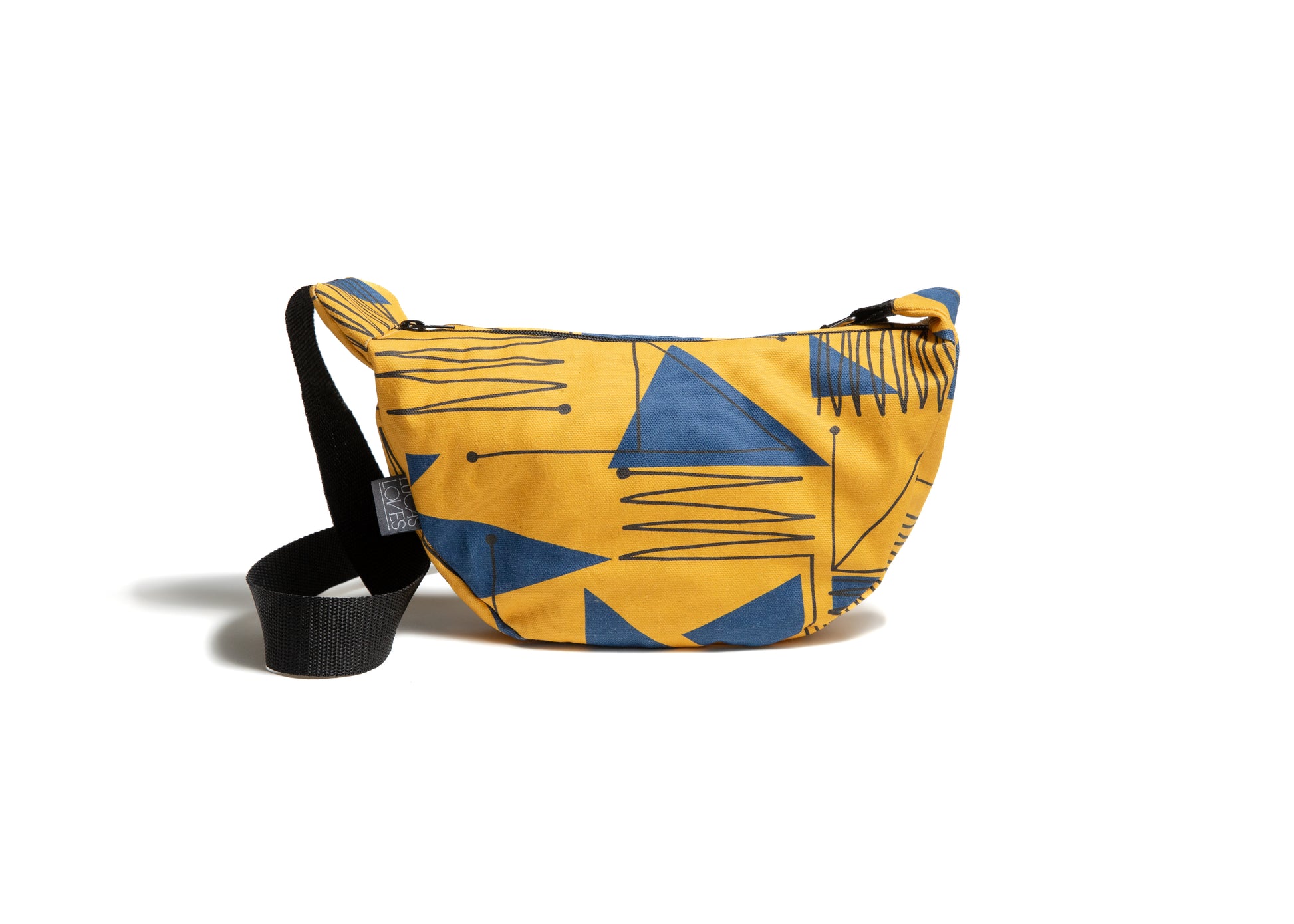 Yellow and blue patterned travel bag on a white background